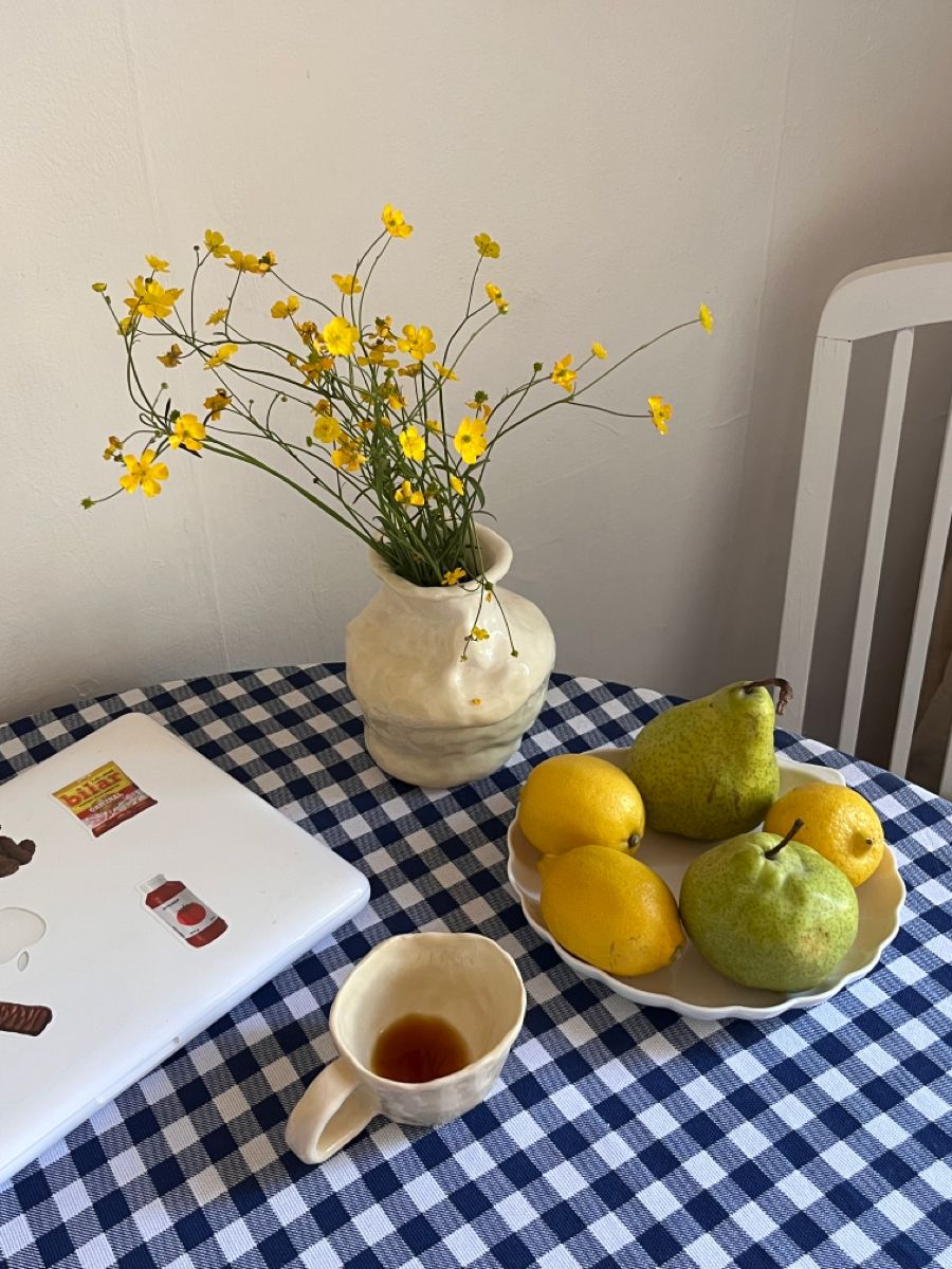 Ceramic tableware displayed in a warm interior